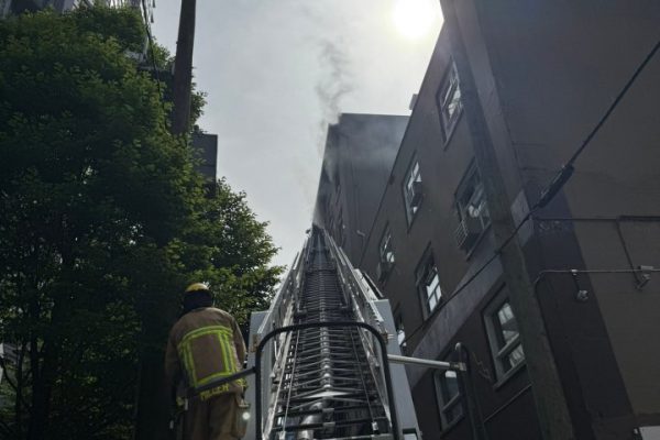 Crews battle 2-alarm fire at former Howard Johnson hotel in Vancouver